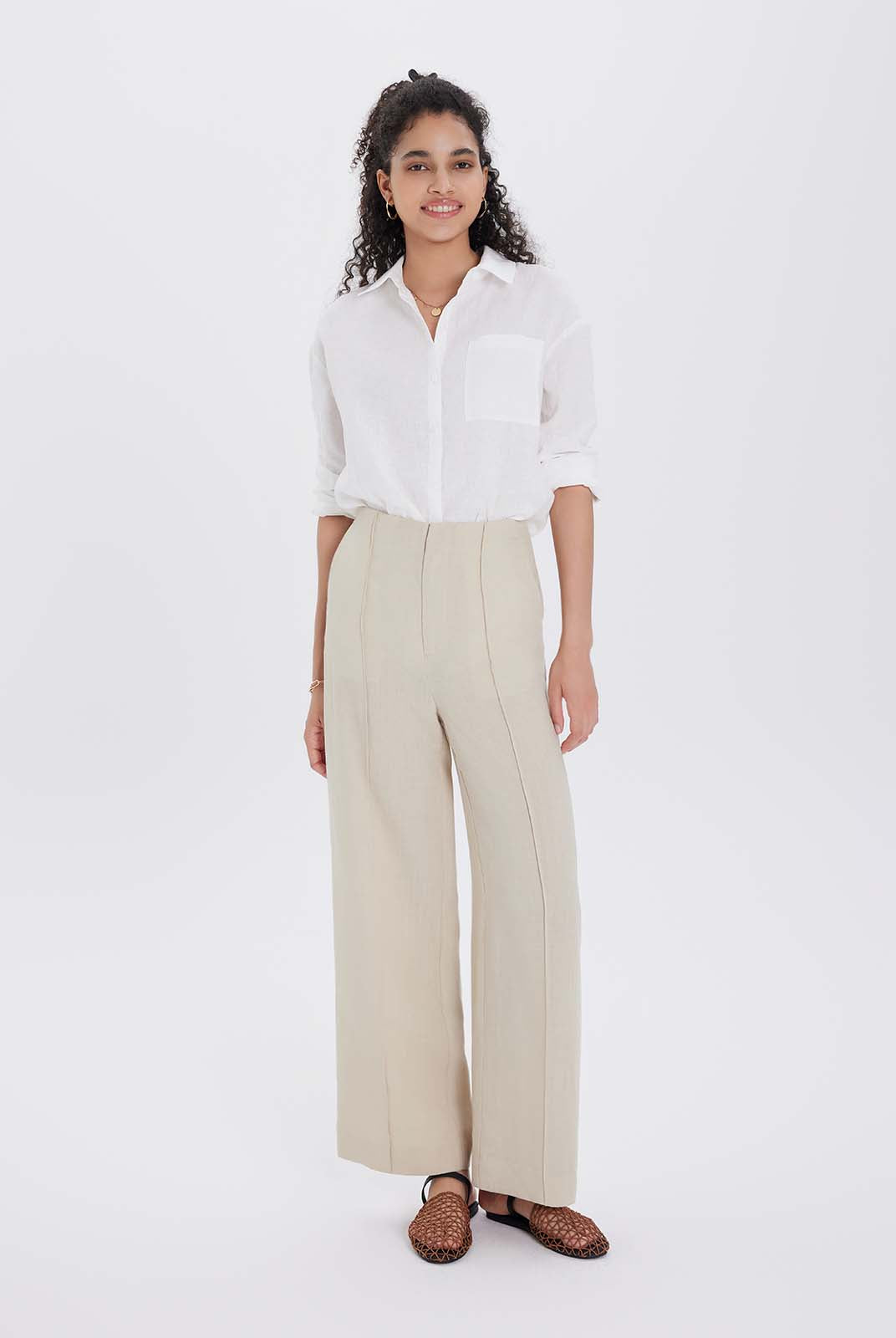 White shirt and beige pants