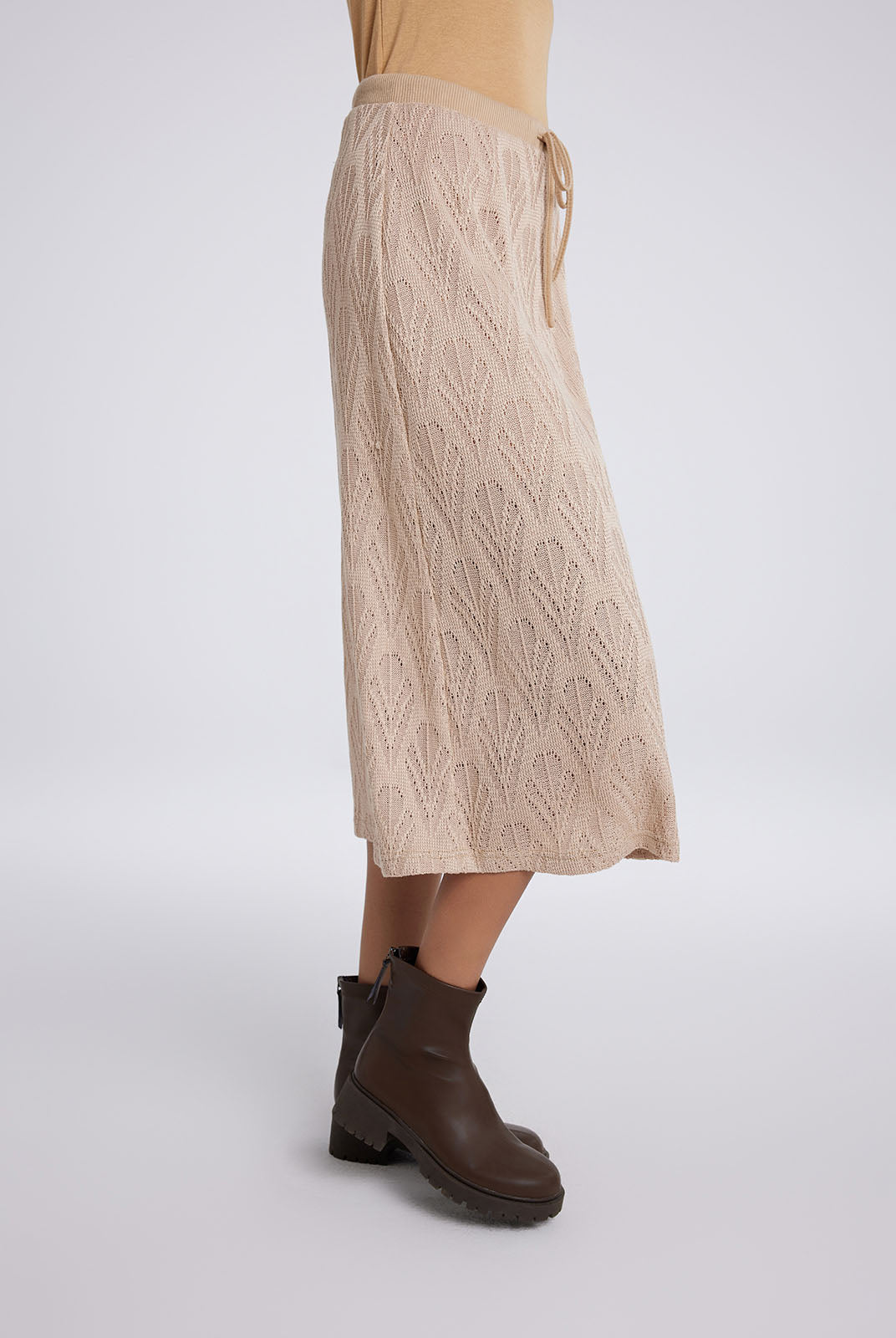 A-line midi skirt with hollow pattern and adjustable laces
