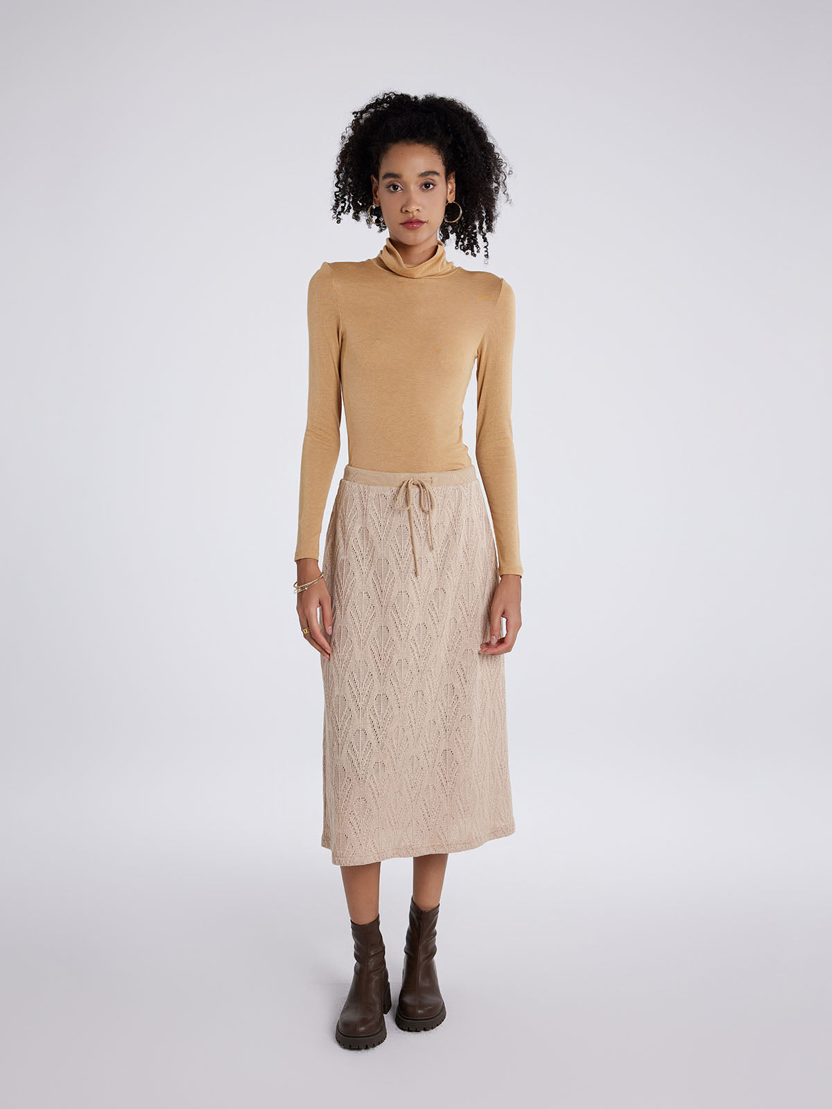 Hollow pattern A-line knit midi skirt