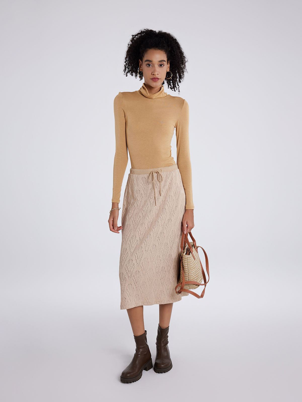 Comfortable A-line knit midi skirt with skin-friendly lining